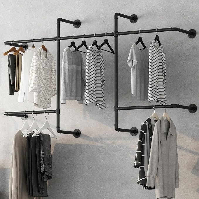 Industrial Pipe Clothing Racks by Unknown